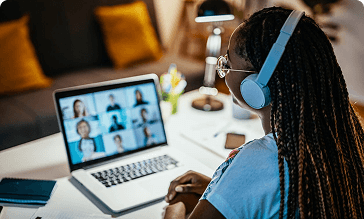 student on laptop conference call